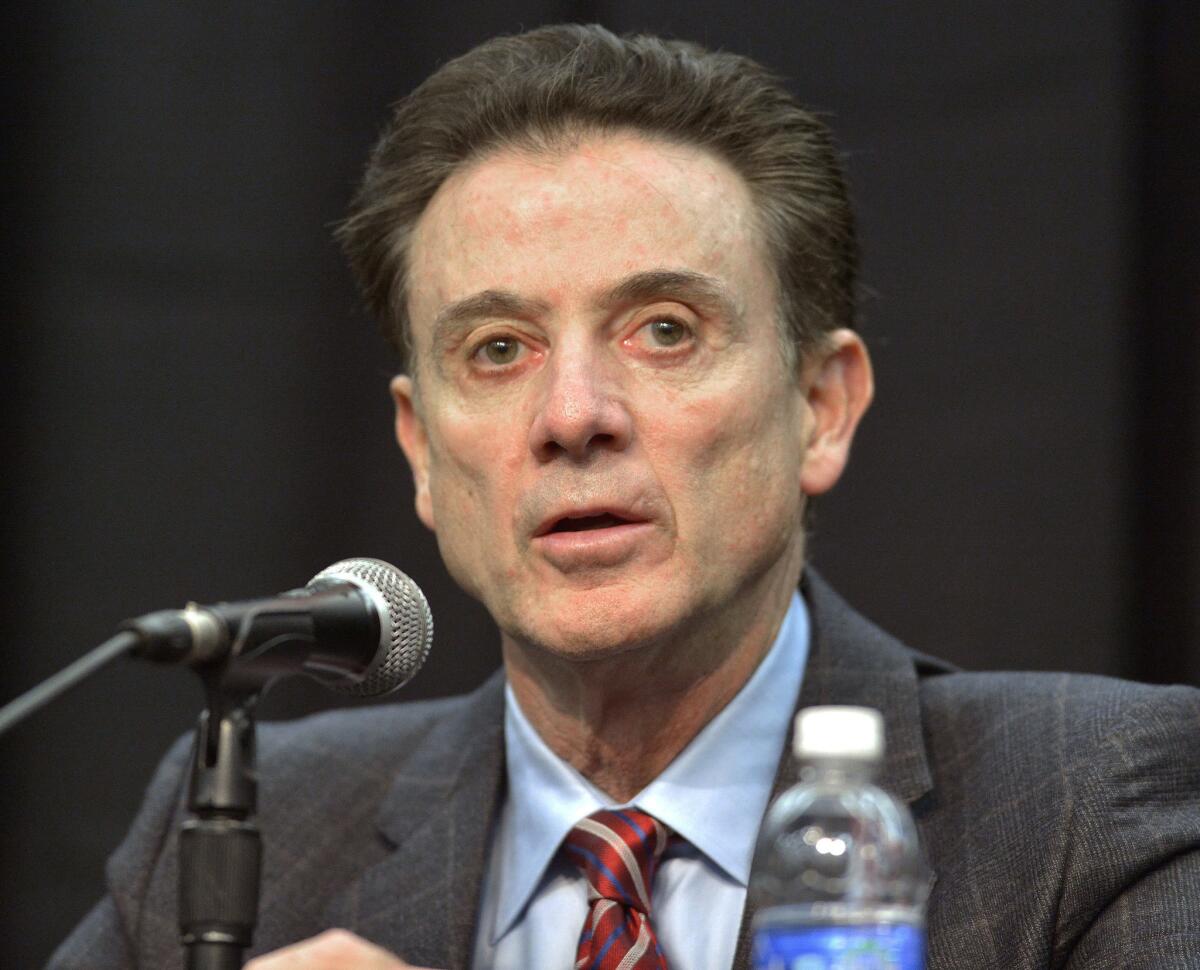 Louisville Coach Rick Pitino speaks to reporters on Feb. 5.