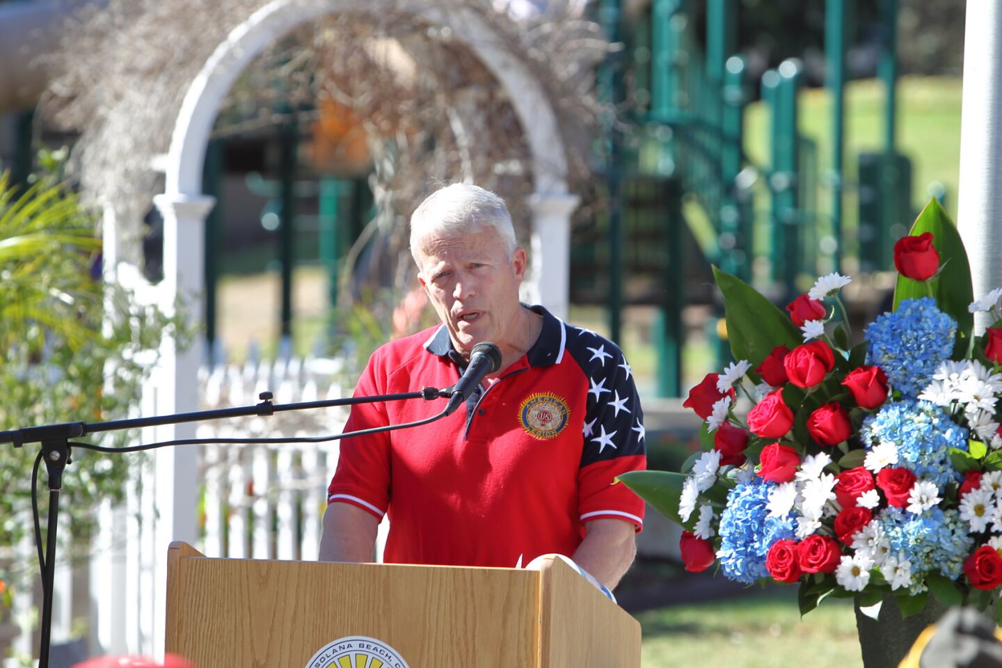 Retired USMC Lt. Col. Marty Conrad reads the poem "In Flanders Fields" at the 2021 Veterans Day Program at La Colonia Park
