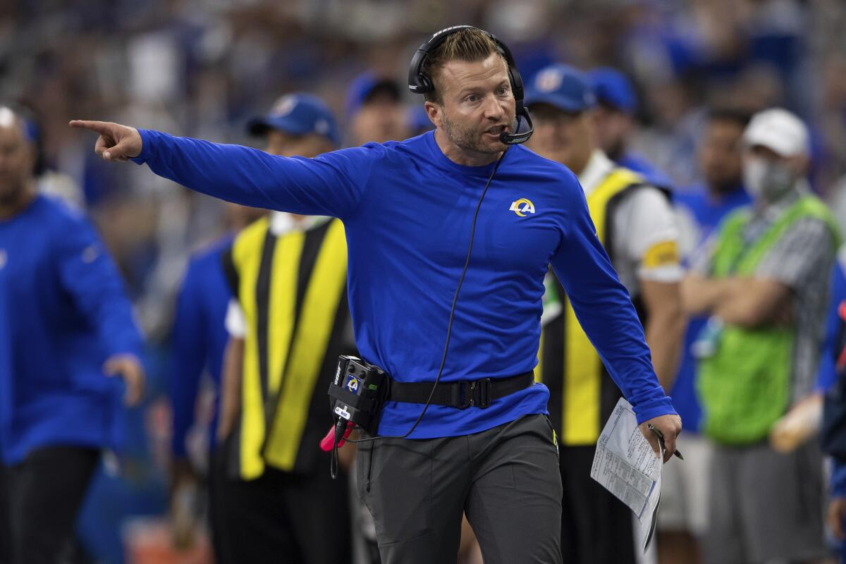  Rams head coach Sean McVay points instructions from the sideline.