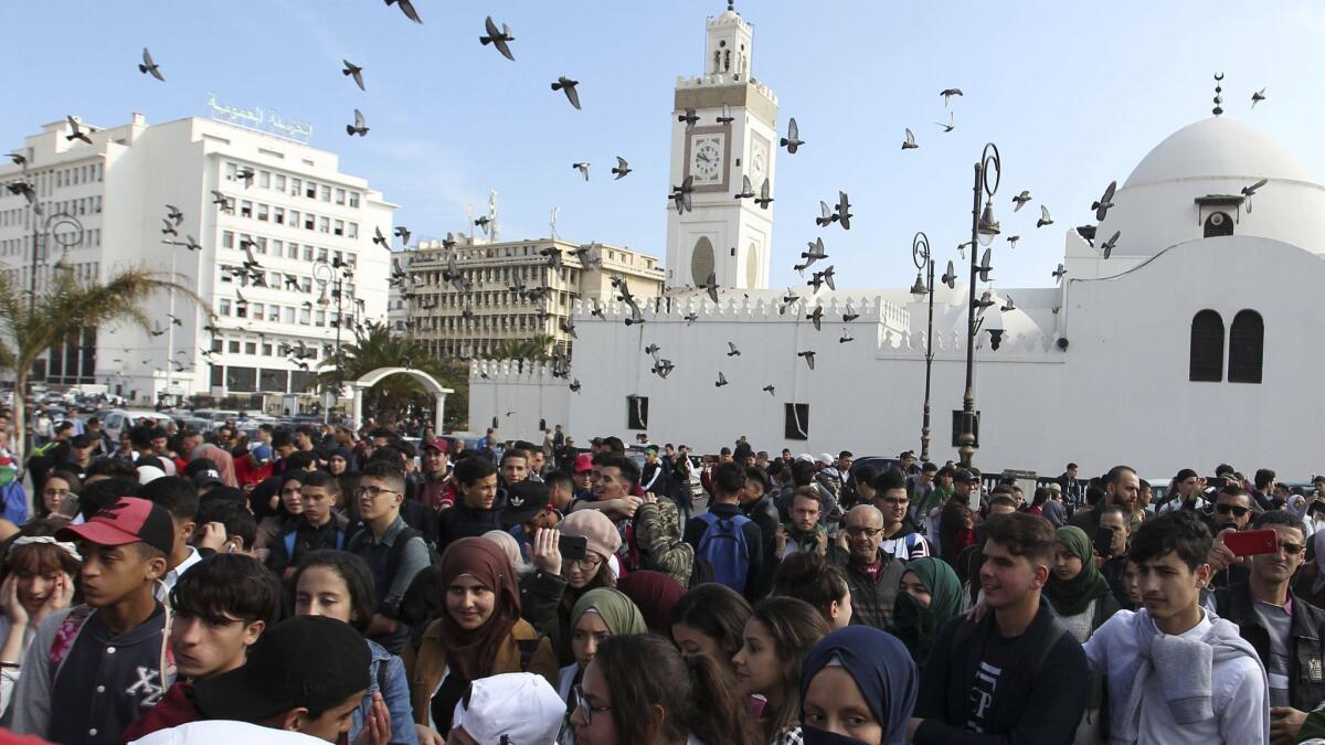High school students march in central Algiers
