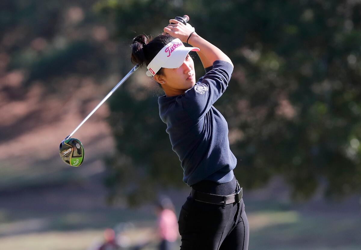 Newport Harbor's Cathy Tong tees off on the 11th hole in the CIF Southern Section Individual Southern Regional tournament at Los Serranos Country Club in Chino Hills on Oct. 29.