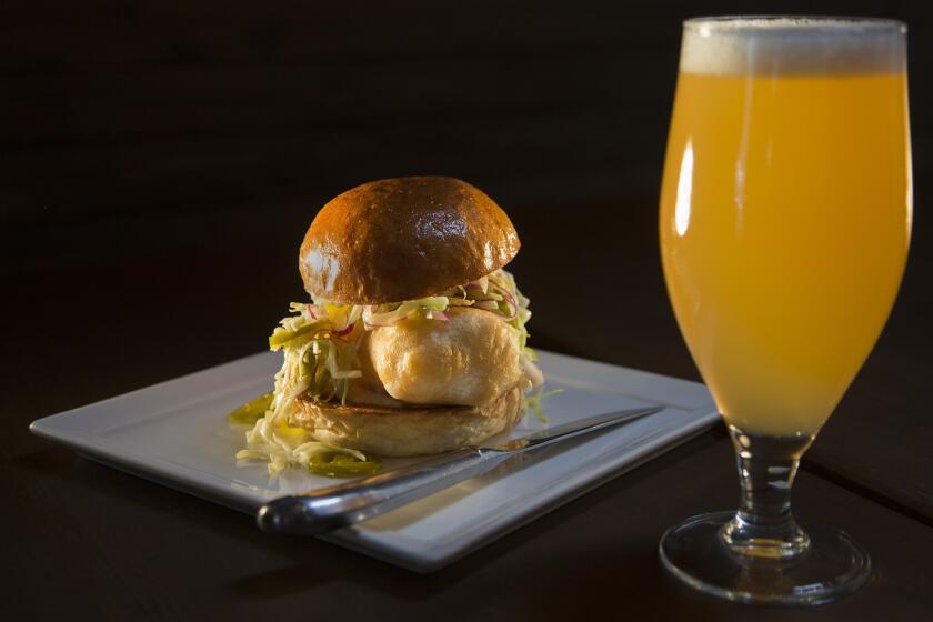 The fried cod sandwich is made with cod battered in Manifesto beer at Eagle Rock Public House Los Angeles, Calif.