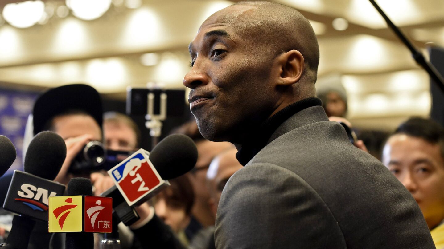 Kobe Bryant listens to a question from a reporter during his media session Friday at NBA All-Star weekend.