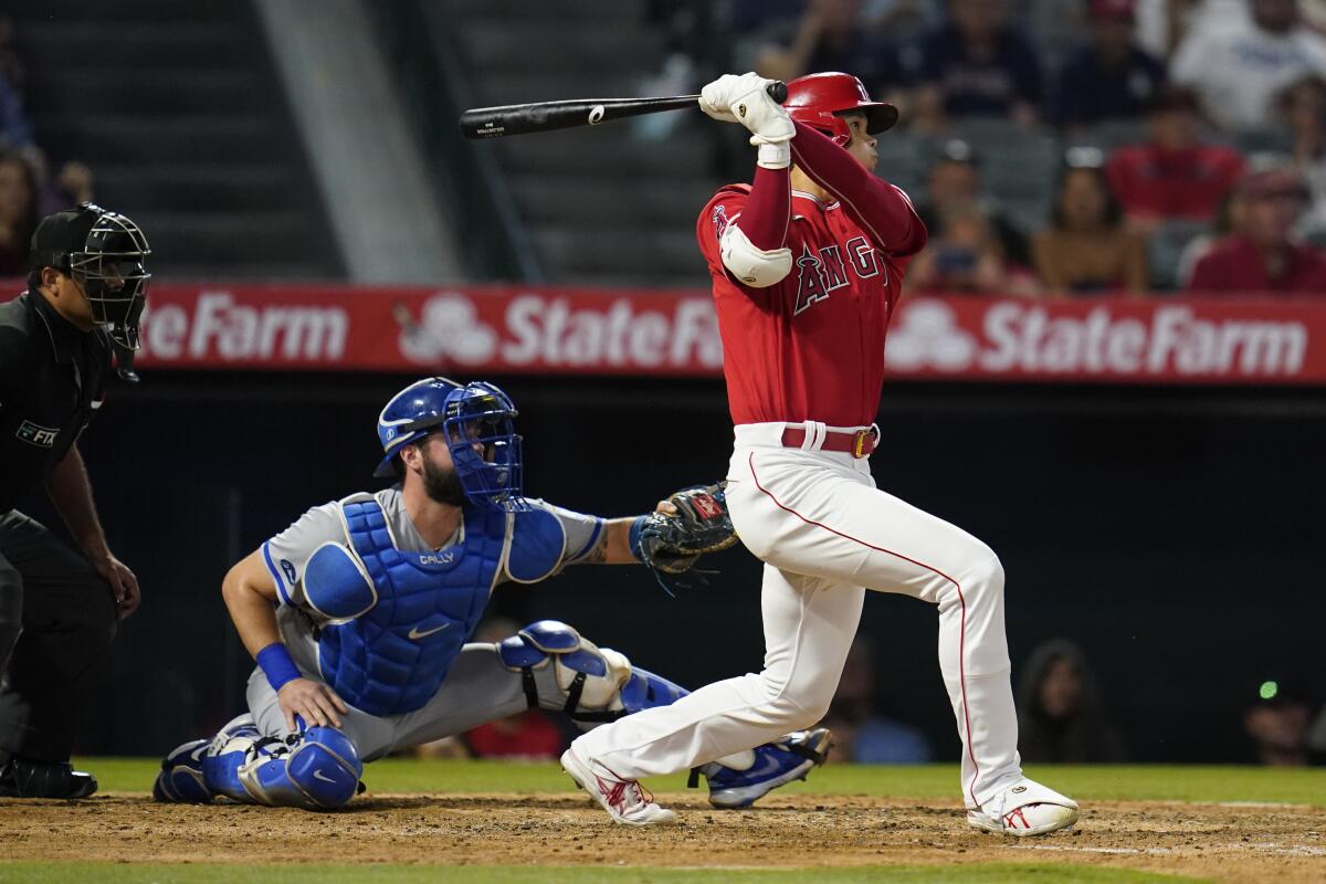 Angels designated hitter Shohei Ohtani hits a home run during the sixth inning against the Kansas City Royals.