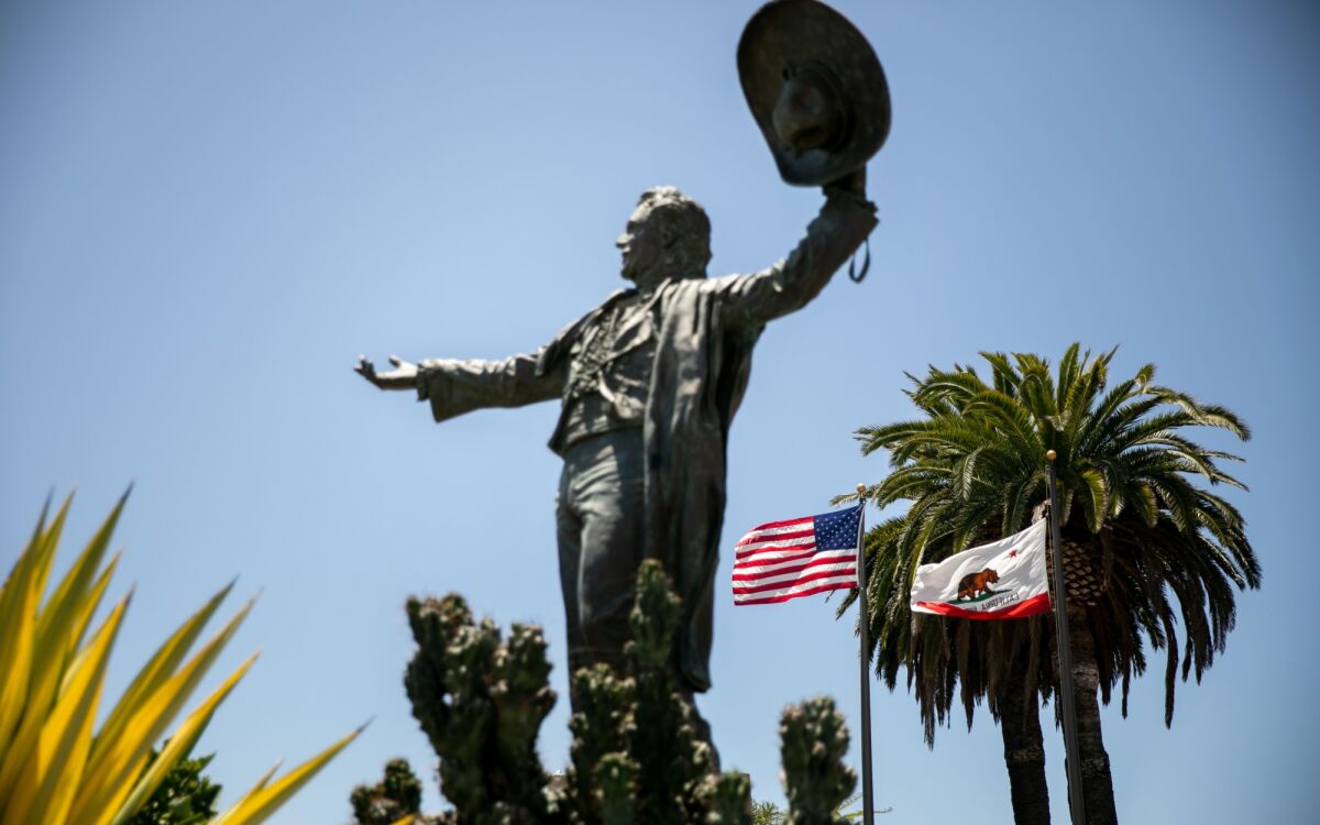 A statue of Don Diego, the late fair ambassador, stands at the gate to the Del Mar Fairgrounds on Wednesday. Fairgrounds officials are asking people to support a request for $20 million in federal aid to help them weather the financial blow they’ve taken during the pandemic