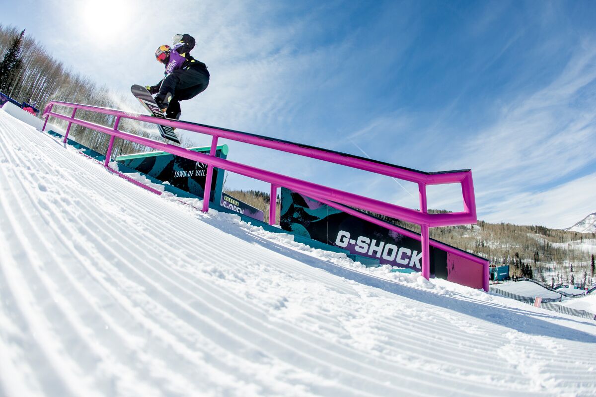Judd Henkes rides a rail at the Burton U.S. Open in Vail, Colo., in February.
