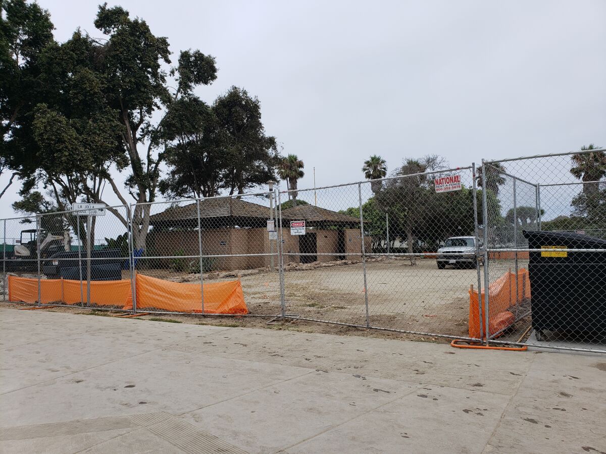 Fencing has gone up in preparation for the demolition and construction of the Scripps Park restroom facility, adjacent the La Jolla Cove.