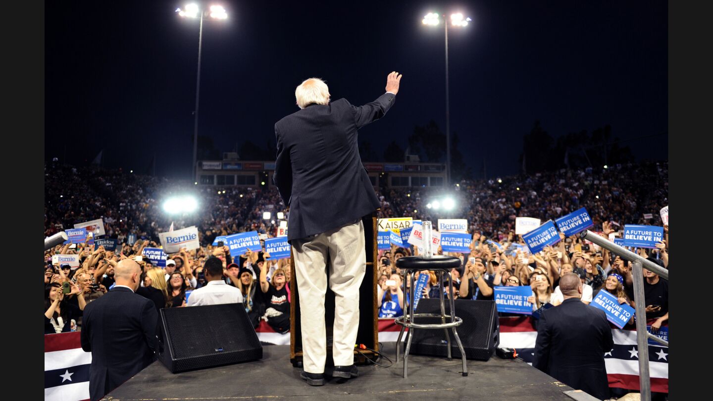 Bernie Sanders waves to the crowd as he's introduced in Carson.