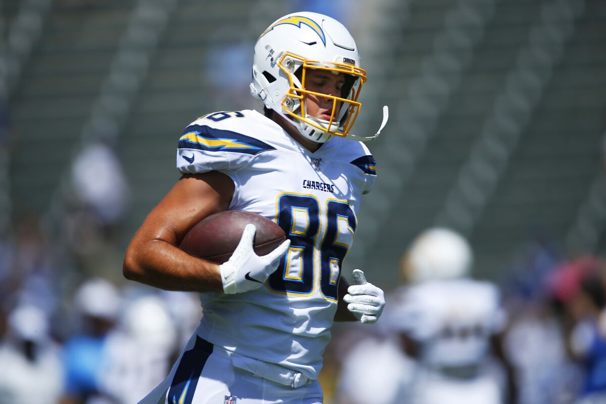 Chargers tight end Hunter Henry warms up before a game against the Colts on Sept. 8.