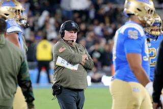 UCLA coach Chip Kelly looks on from the sideline and reacts after the Bruins failed to score against Arizona State 