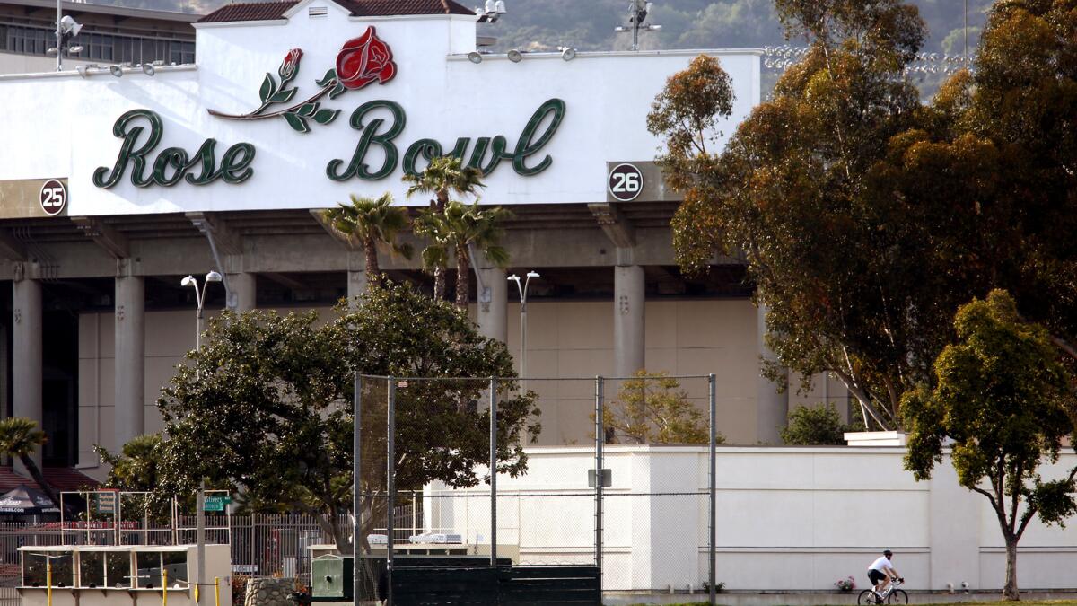 Rose Bowl stadium, as seen from Seco Street, will be the site of a College Football Playoff semifinal Monday between Oklahoma and Georgia.