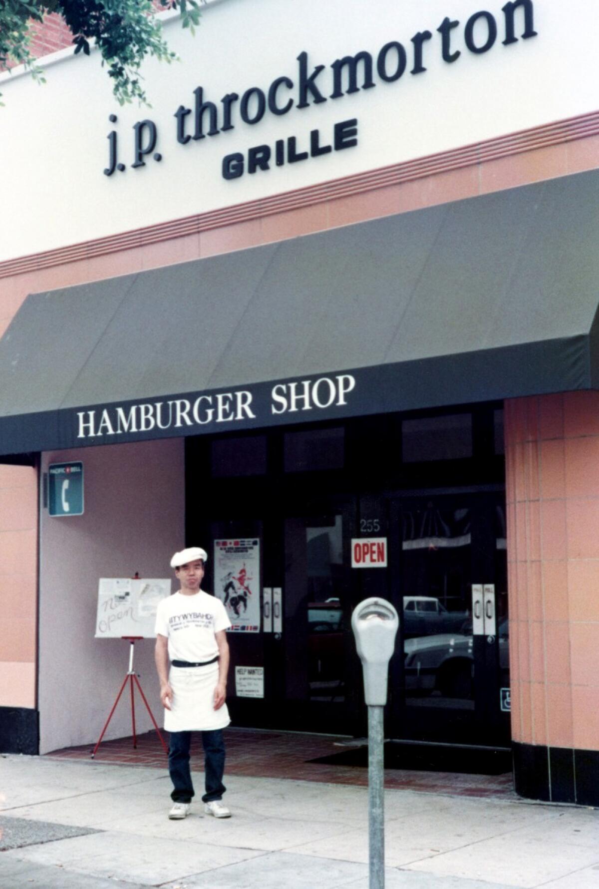 Sadao Nagumo stands outside Jeremiah P. Throckmorton Grille in Beverly Hills in 1989.