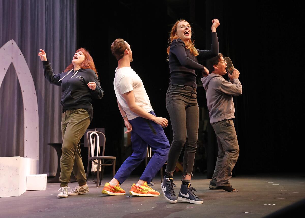 Actors Alison Nusbaum, Danny Crowe, MaryAnn DiPietro and John Adkison rehearse a scene at Laguna Playhouse on Wednesday.