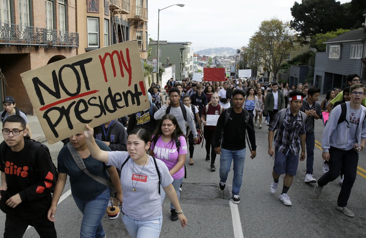 High school students in San Francisco march against Donald Trump's election victory.