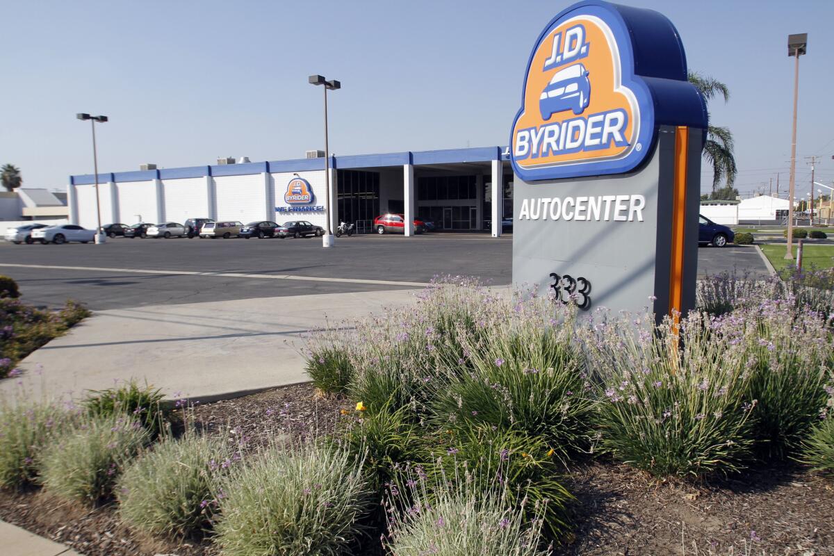 The fast growing Buy Here Pay Here used car business, which is making huge profits off people with damaged credit. The J.D. Byrider used car dealership in Visalia, Calif., property used to be a Honda dealership, but that moved to a better neighborhood. Now the inventory is mostly beat¿up older cars sold at stiff markups, with high¿interest loans. The buyers accept the terms because they have bad credit and no other options. Appearances aside, selling junkers to the working poor is a very lucrative business, and that's why Altamont Capital, a private equity firm, acquired the J.D. Byrider chain of 127 dealerships in May.