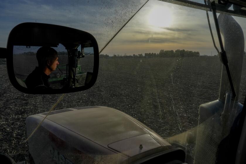 Mark Woodruff operates a planter in a soybean field, Monday, April 22, 2024, in Sabina, Ohio. As climate change drives an increase in spring rains across the Midwest, it can mean more anxiety for farmers eager to carry out the ritual of spring planting. (AP Photo/Joshua A. Bickel)