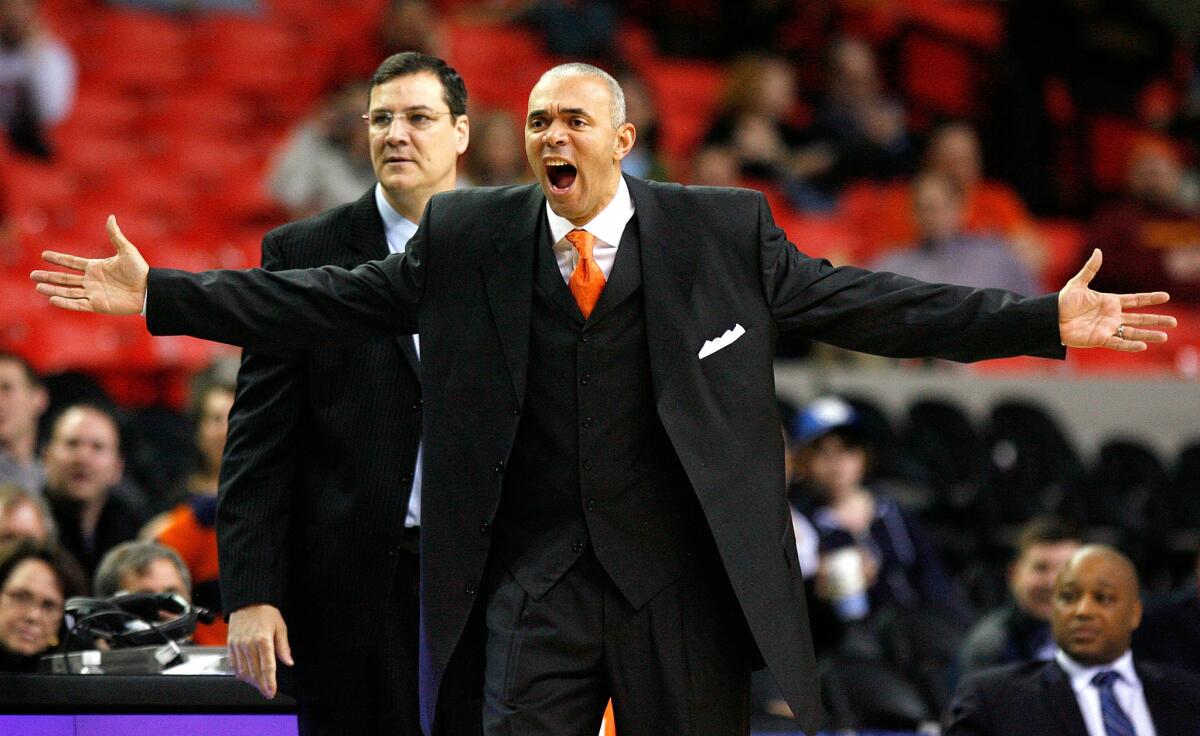 Dave Leitao, then head coach of the Virginia Cavaliers, questions a call during the 2009 ACC Tournament. Leitao is returning to DePaul where he coached from 2002-2005.