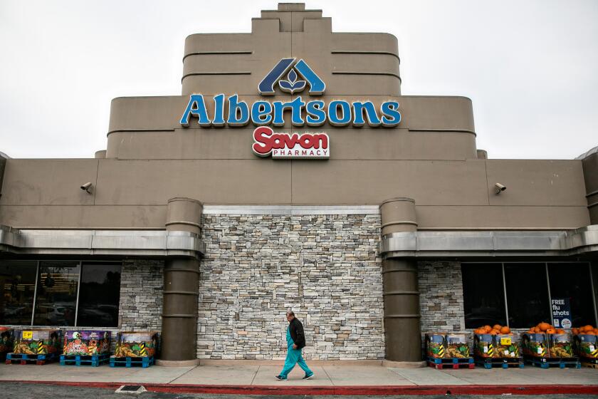 LOS ANGELES, CA - OCTOBER 14: A shopper visits Albertsons at 3901 Crenshaw Blvd on Friday, Oct. 14, 2022 in Los Angeles, CA. Kroger, that parent company of Ralphs, plans to buy Albertsons, parent company of Vons, in a deal valued at $24.6 billion, a merger that would combine the two largest grocery-store chains in the U.S. (Jason Armond / Los Angeles Times)