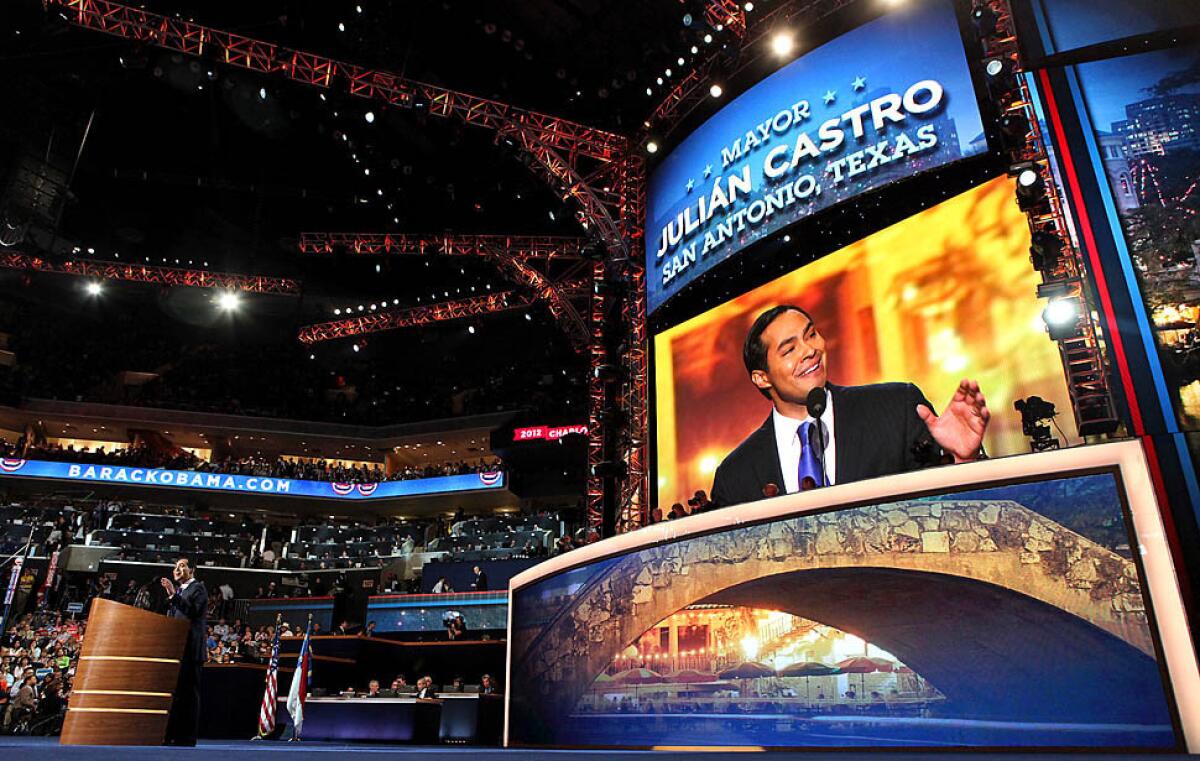 San Antonio Mayor Julian Castro waves before addressing the delegates during the opening night ceremonies of the Democratic National Convention at the Time Warner Cable Arena in Charlotte, N.C.