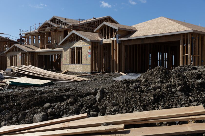 Single-family homes under construction at KB Home’s Ridgeview housing complex at San Marcos on Monday, Feb. 13, 2023. The homes are selling for over $1 million.