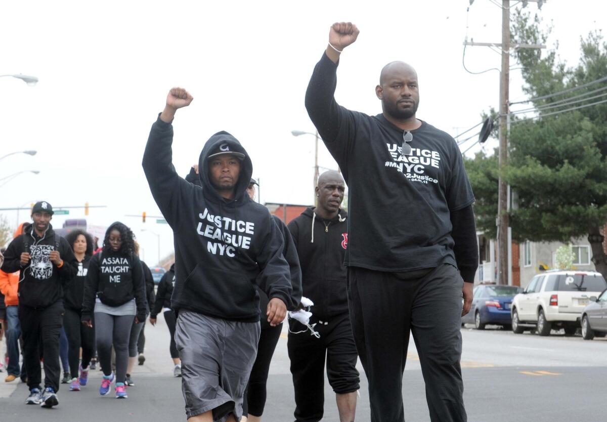People in Baltimore demonstrate against the police following the death of Freddie Gray.