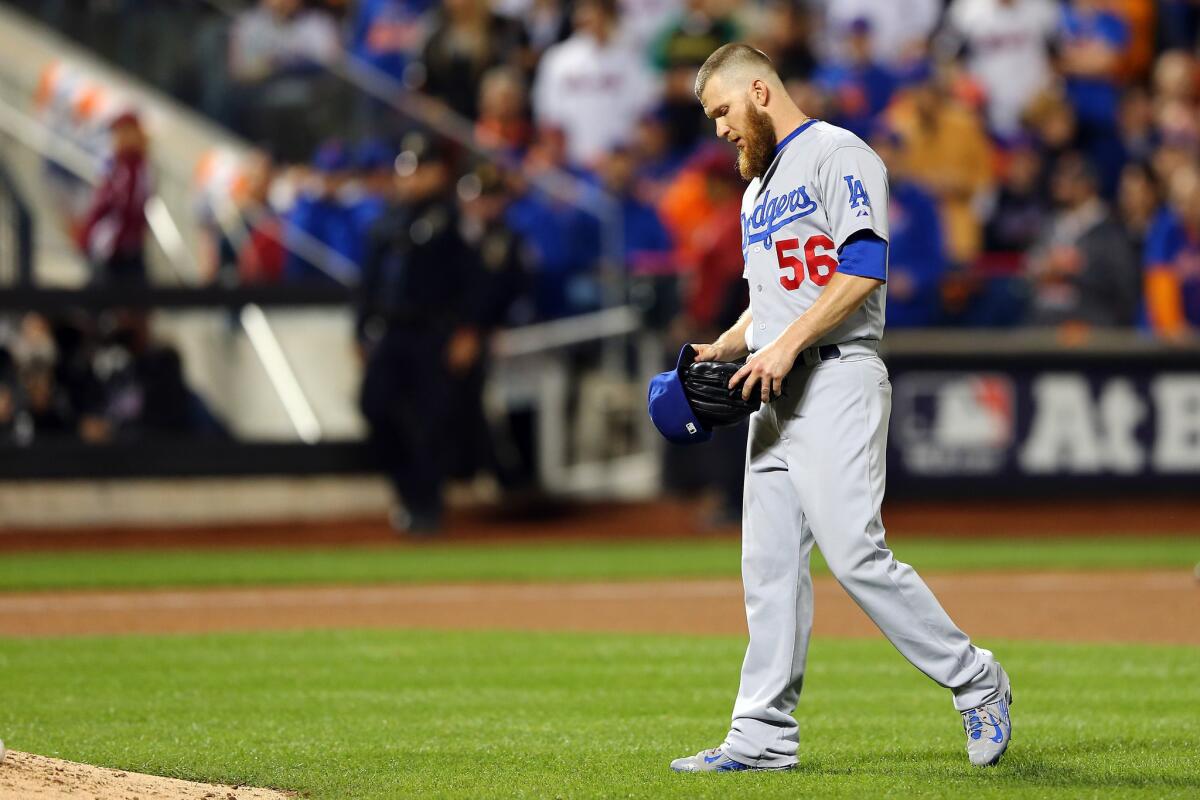 Dodgers reliever J.P. Howell walks back to the mound in the seventh inning of Game 3 of the National League division series against the New York Mets.