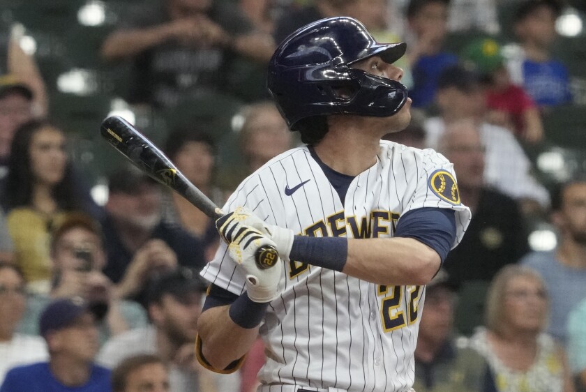 Milwaukee Brewers' Christian Yelich hits a three-run scoring double during the fourth inning of a baseball game against the Pittsburgh Pirates Saturday, June 12, 2021, in Milwaukee. (AP Photo/Morry Gash)