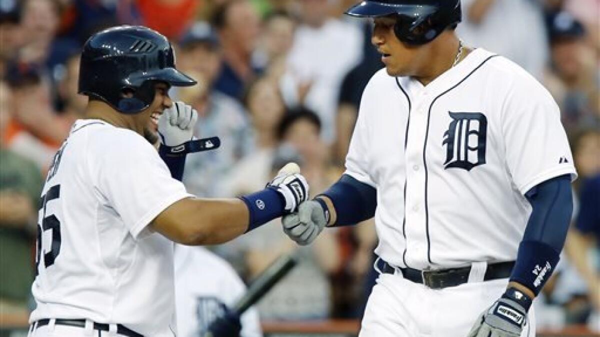 Detroit Tigers' Andy Dirks hits a solo home run off Cleveland