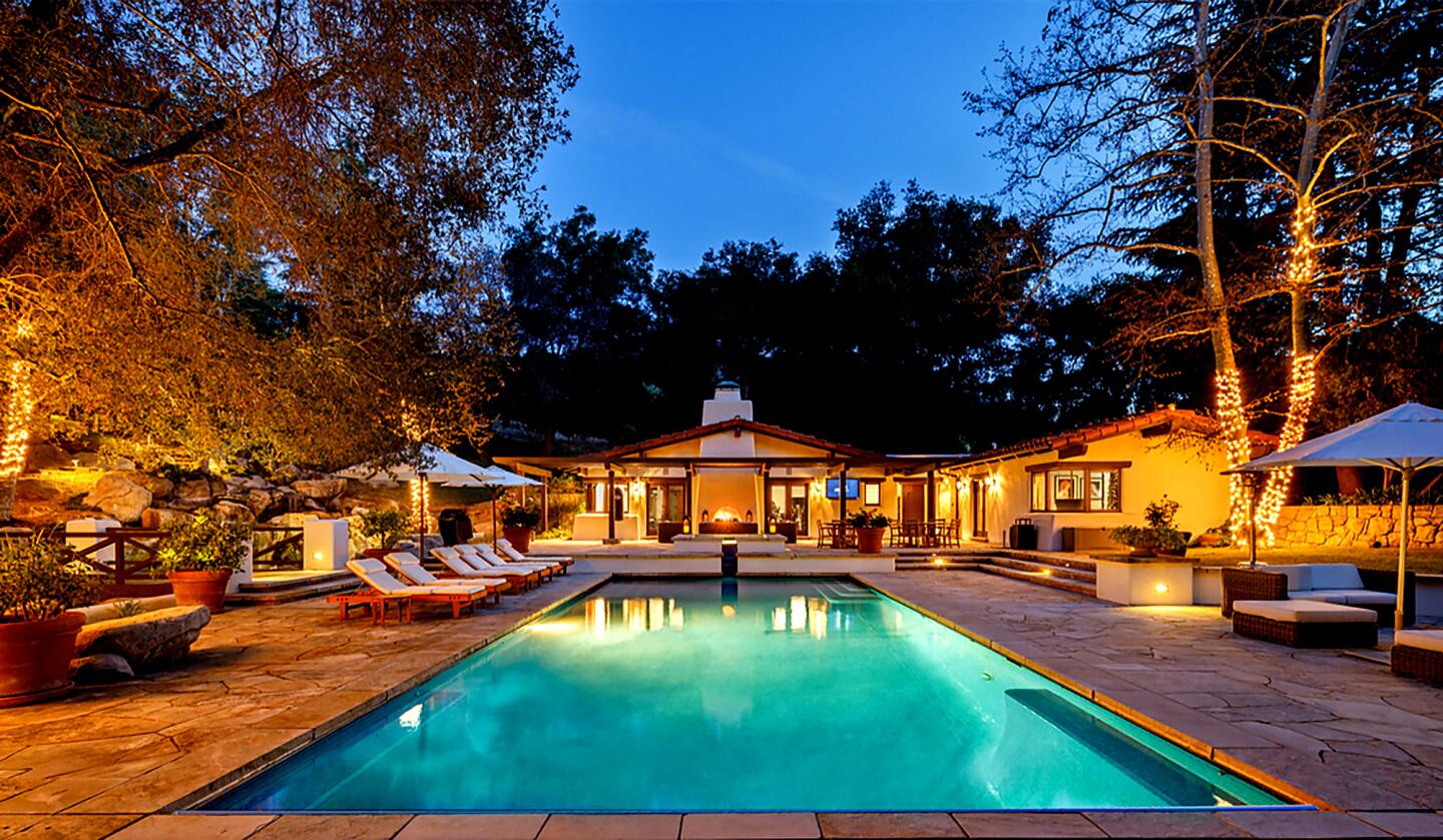 Spanish in style, the leafy compound sprawls across five acres in the Santa Monica Mountains above Malibu.