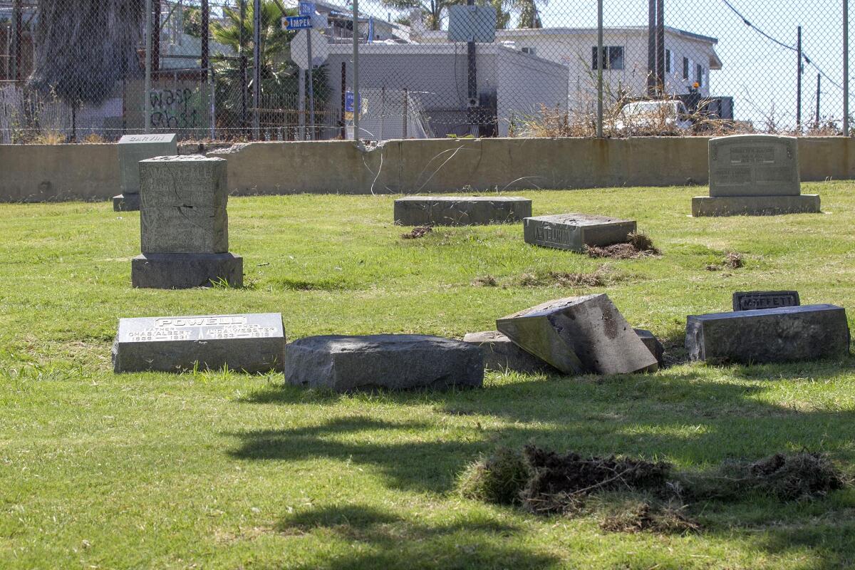 Several tombstones were damaged at the Home of Peace cemetery in San Diego after a car crashed into them early Monday morning. The 2 a.m. crash sent one person to the hospital and police are looking for the driver who fled the scene.