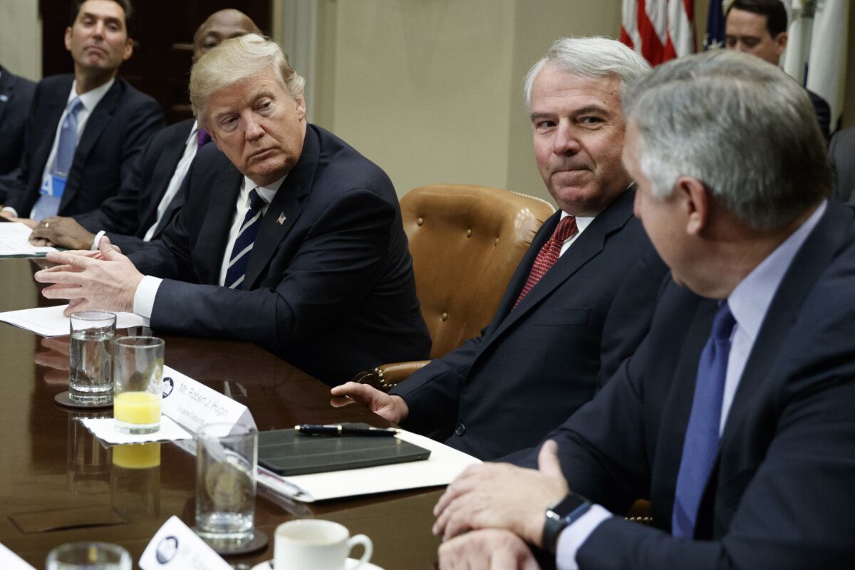 President Trump met with pharmaceutical industry leaders at the White House on Tuesday. From left are PhRMA President Stephen Ubl, Merck CEO Kenneth Frazier, Trump, Celgene CEO Robert Hugin and Amgen CEO Robert Bradway.