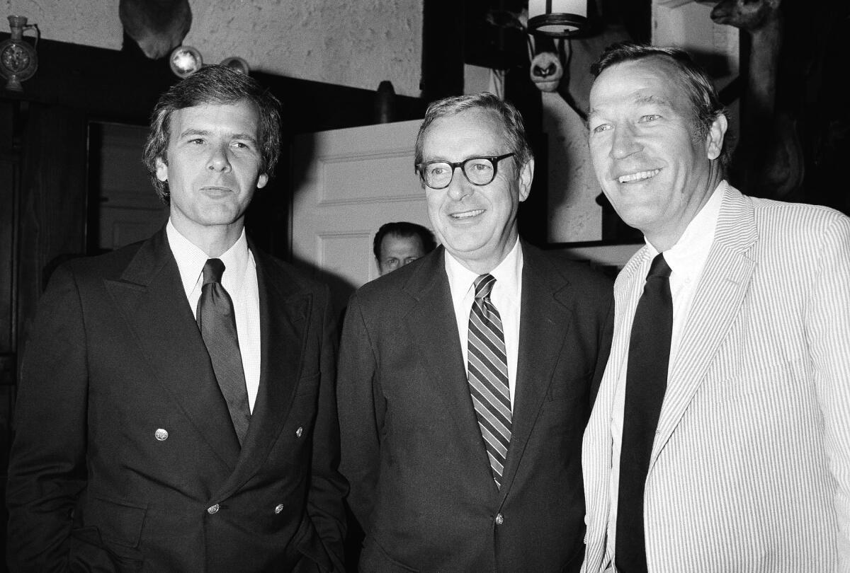 John Chancellor, center, with Tom Brokaw, left, and Roger Mudd, right, in 1981.