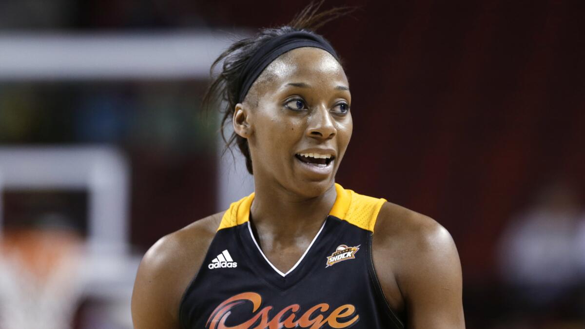 Tulsa Shock forward Glory Johnson takes part in a preseason game against the Seattle Storm in May 2013.