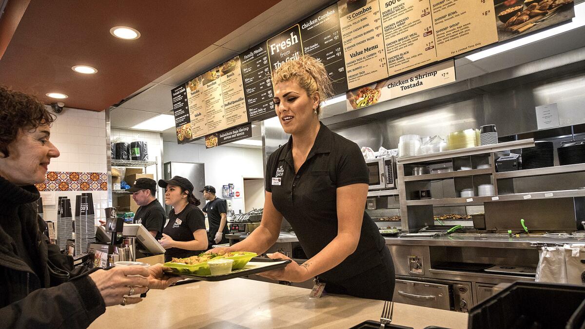 Manager Kristy Ramirez at work in an El Pollo Loco.