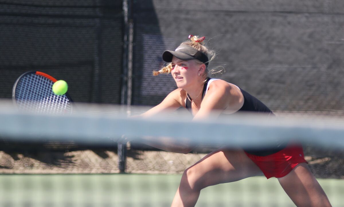 Junior Lyna Fowler put away the championship-clinching doubles point for the Ravens.