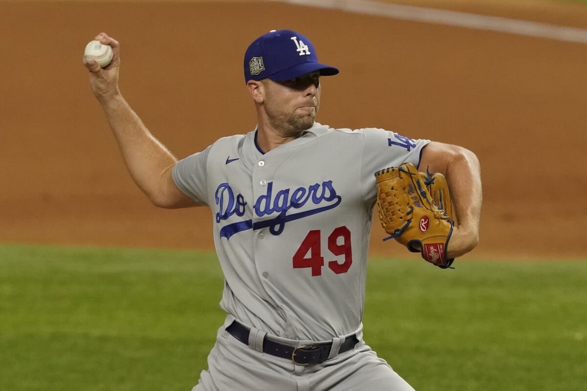 Dodgers relief pitcher Blake Treinen delivers during the seventh inning against the Rays.