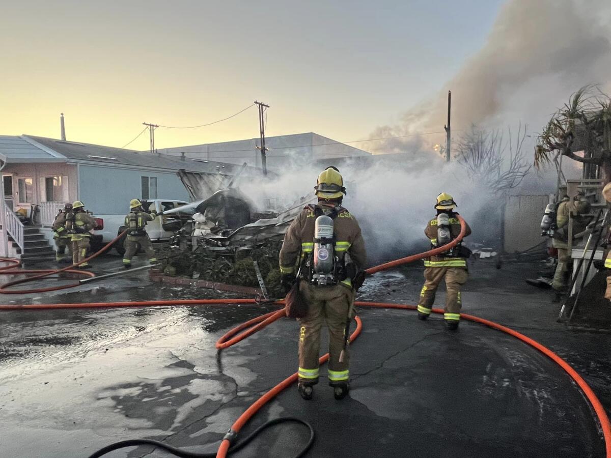 Firefighters put out a blaze that destroyed a home in Costa Mesa Saturday.
