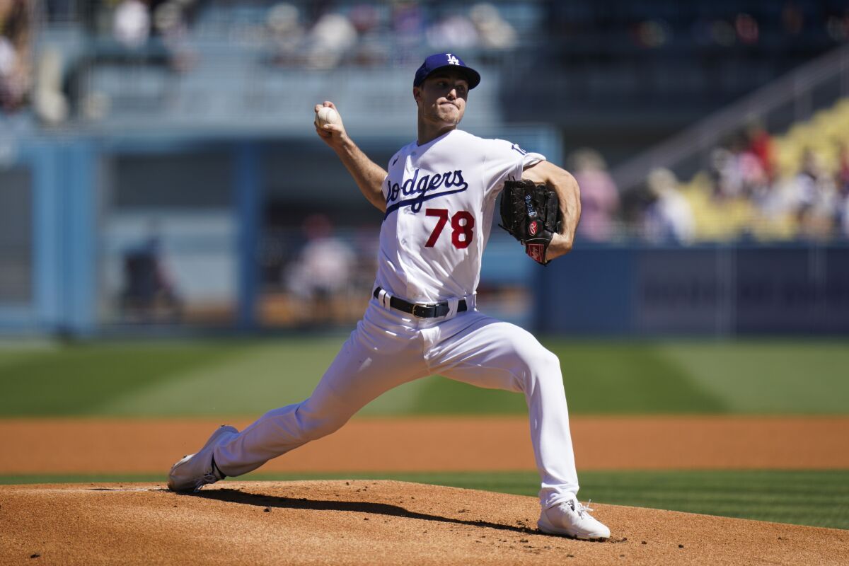 Dodgers starting pitcher Michael Grove delivers against the St. Louis Cardinals in the first inning Sunday.