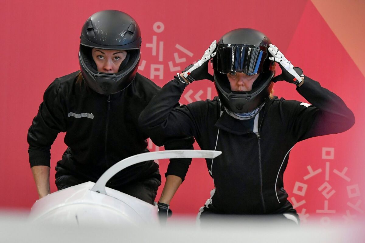 Olympic Athlete from Russia bobsled pilot Nadezhda Sergeeva, right, and her teammate Anastasia Kocherzhova train at the Pyeongchang Games.