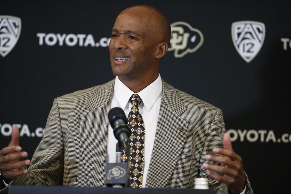 Karl Dorrell speaks at his introductory news conference at Colorado.