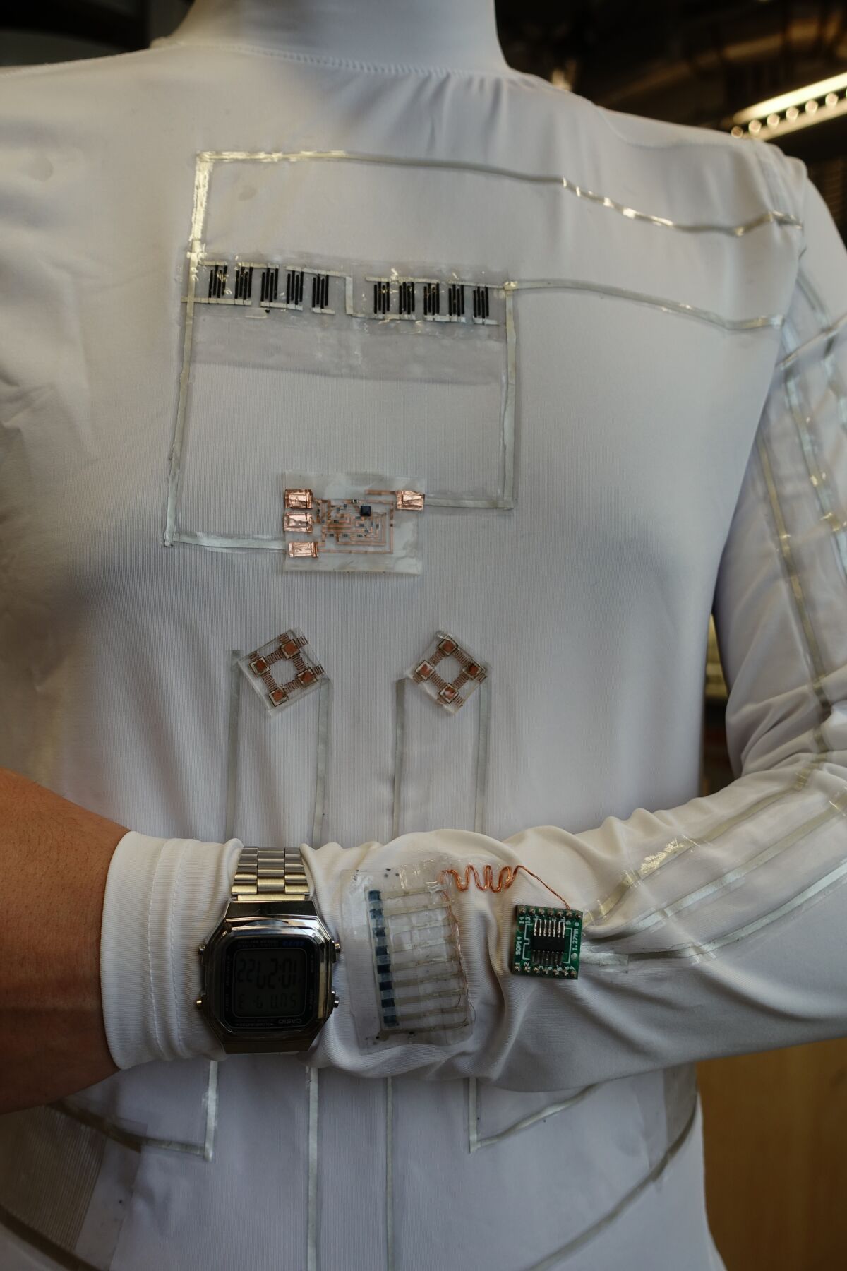 Close-up of the "wearable microgrid," a washable shirt harvests and stores energy  