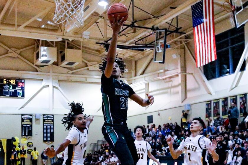 Marcus Adams Jr. goes up for two of his 40 points in Narbonne's 77-67 win over San Pedro.