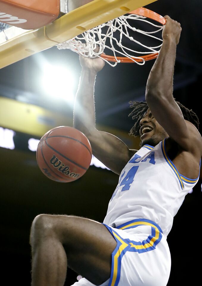 UCLA forward Jalen Hill dunks during the first half of the Bruins' 93-64 victory over San Jose State.