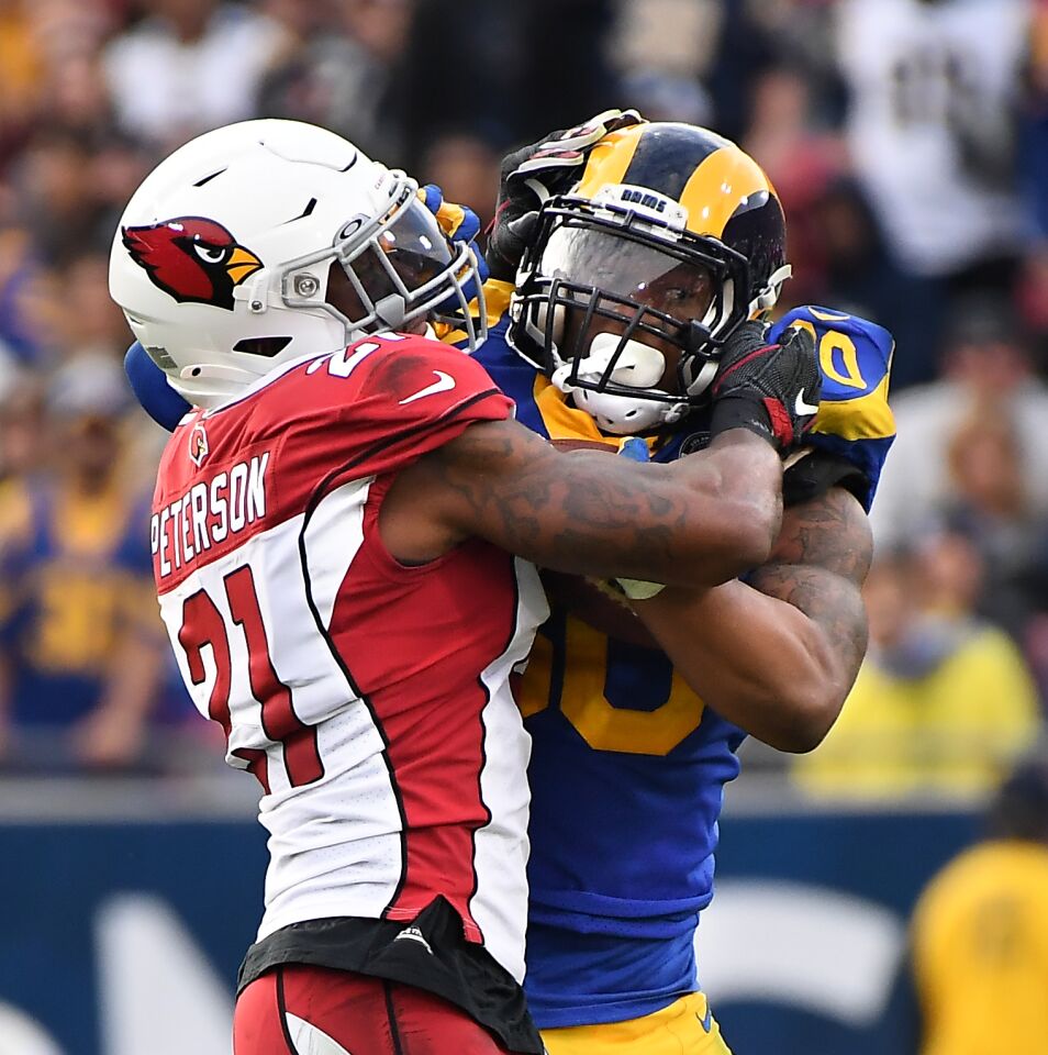 Rams running back Todd Gurley is stopped for a loss by Arizona Cardinals cornerback Patrick Peterson during the third quarter.