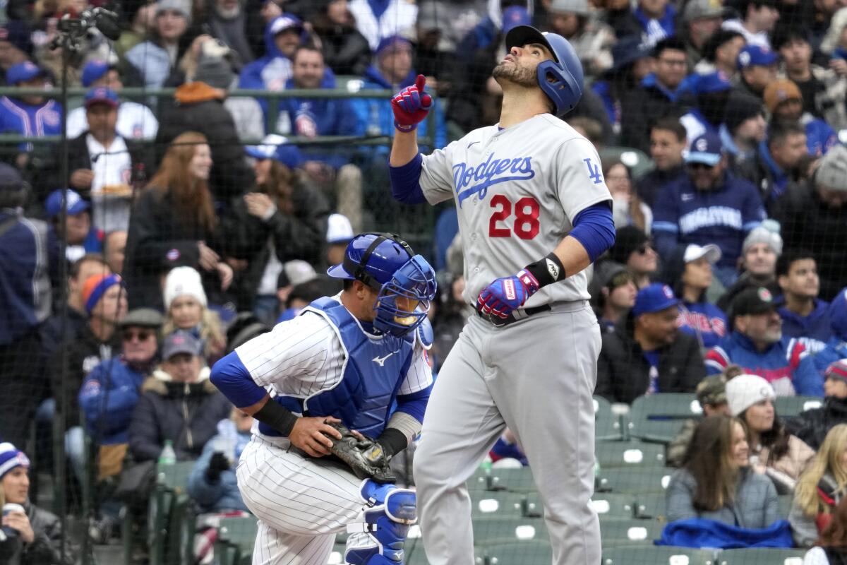 Dodgers designated hitter J.D. Martinez celebrates after hitting a solo home run in the sixth inning Sunday.