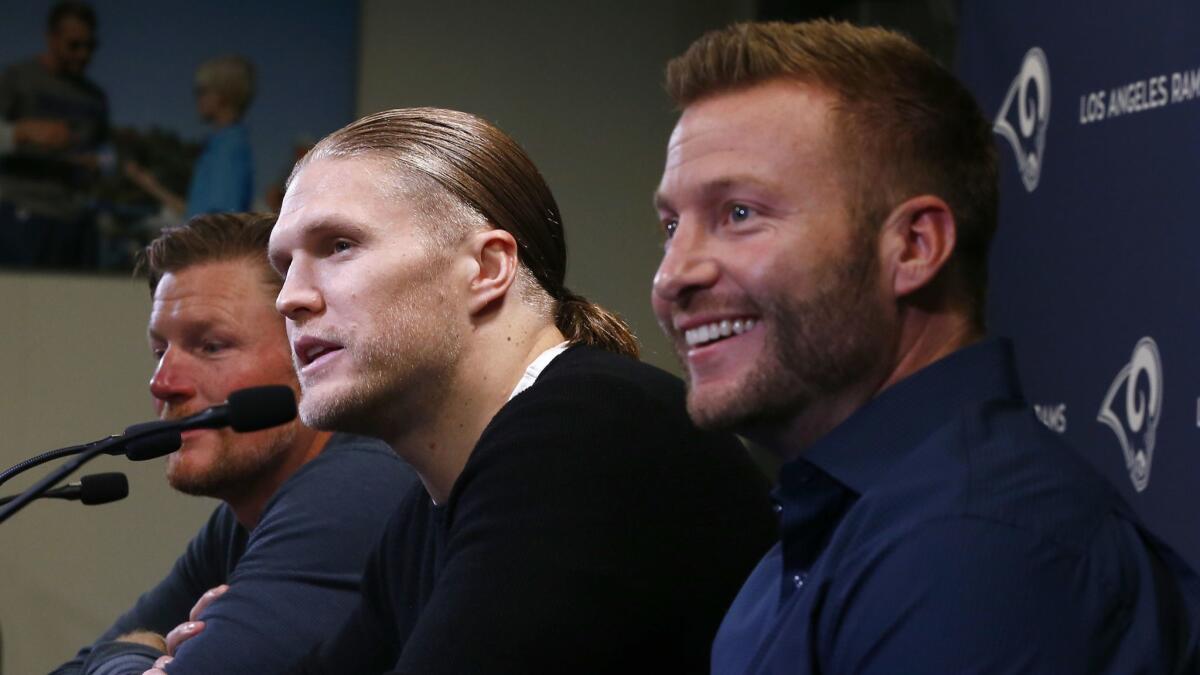 Clay Matthews is flanked by Rams general manager Les Snead, left, and head coach Sean McVay.