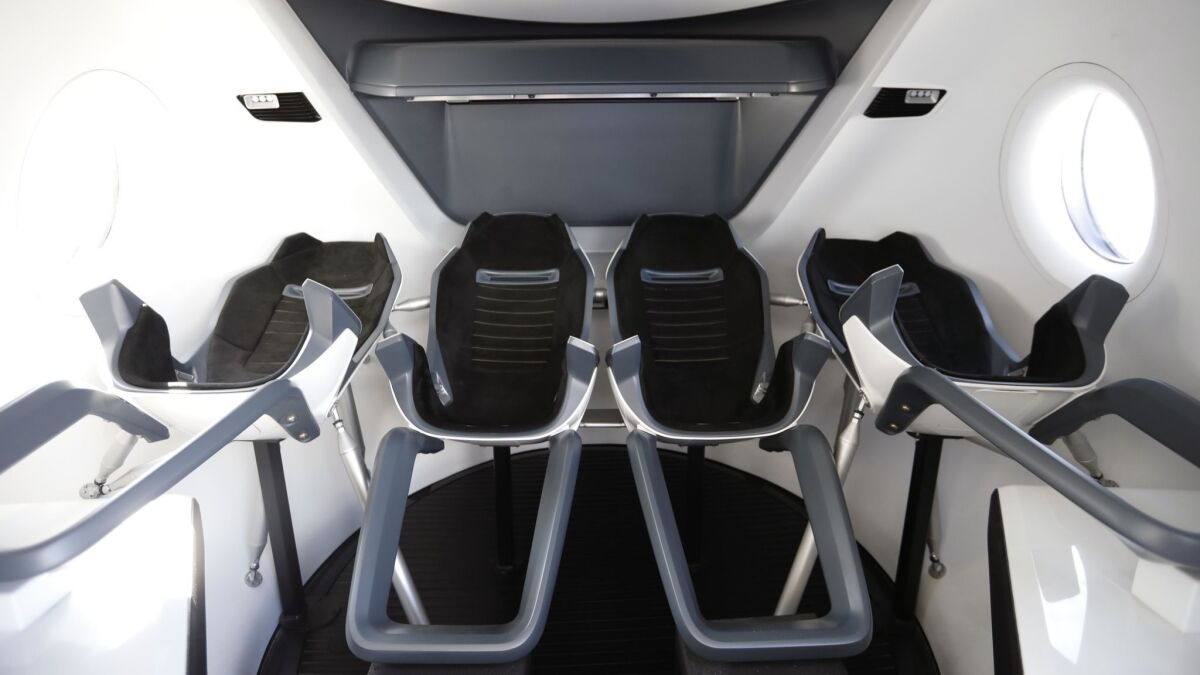 The inside of SpaceX's Crew Dragon spacecraft, whose first flight is scheduled for later this year.