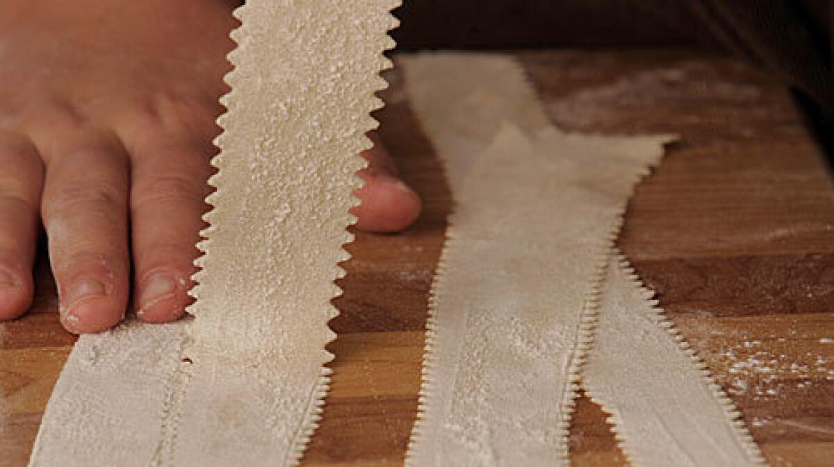Kids can cut out homemade pappardelle with a fluted pasta cutter, a pizza wheel or a pair of kitchen shears.