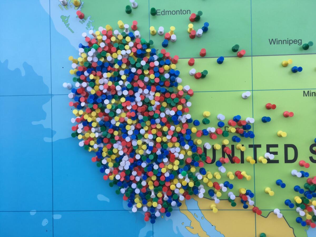 Pins on a map of the world show where Oregon Solarfest visitors traveled from.