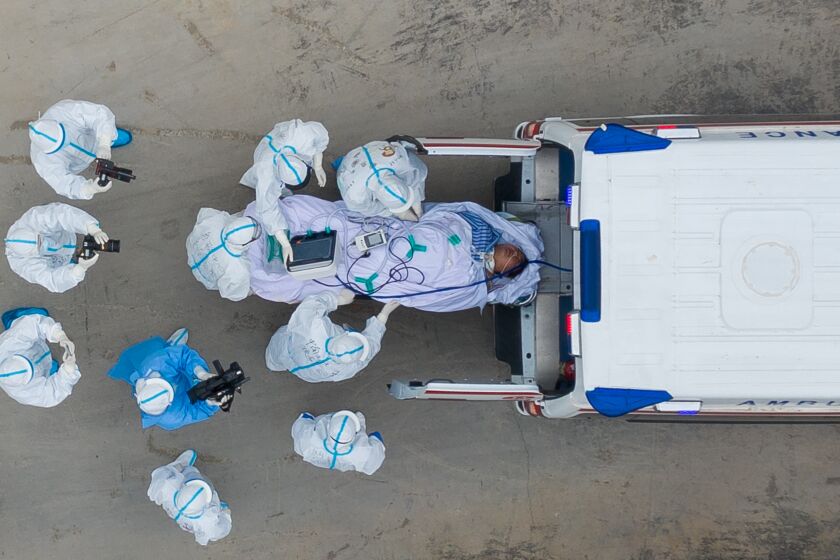 WUHAN, CHINA - APRIL 14, 2020 - Ambulances carrying the last batch of patients leave leishenshan hospital and transfer to other hospitals, Wuhan City, Hubei Province, China, April 14, 2020. Tomorrow, leishenshan hospital will be closed for standby.- PHOTOGRAPH BY Costfoto / Barcroft Studios / Future Publishing (Photo credit should read Costfoto/Barcroft Media via Getty Images)